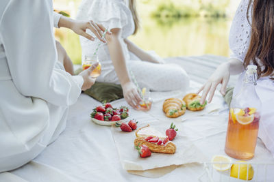 High angle view of woman having food at home