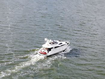 High angle view of boat sailing in water