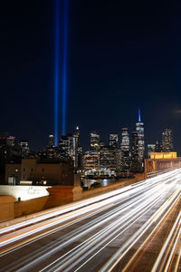 High angle view of light trails on road at night