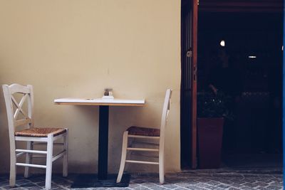 Empty chairs and table at home