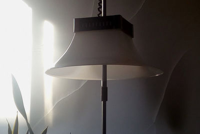 Low angle view of illuminated lamp