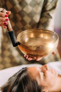 Tibetan singing bowl in sound healing therapy