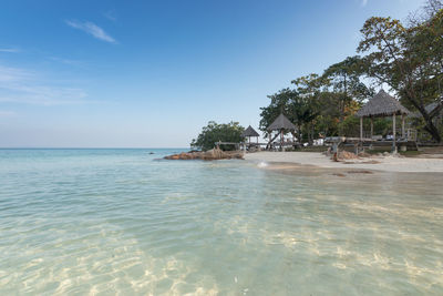 View of beach against blue sky