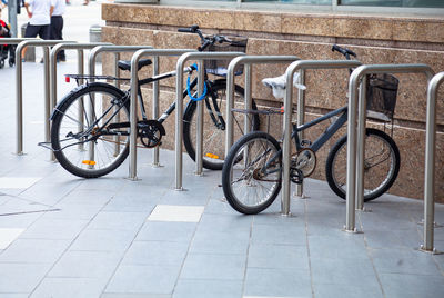 Bicycles parked on footpath
