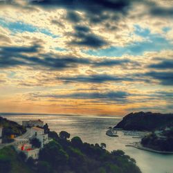 Scenic view of sea against cloudy sky