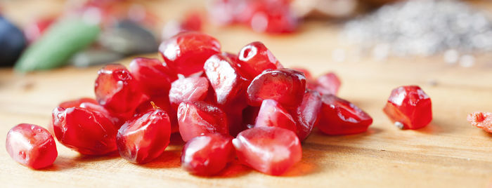 Close-up of pomegranate seeds on table