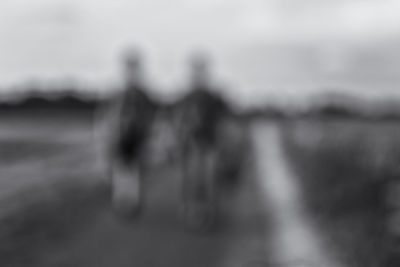 Close-up of hands against blurred background