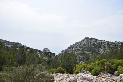 Scenic view of rocky mountains against sky