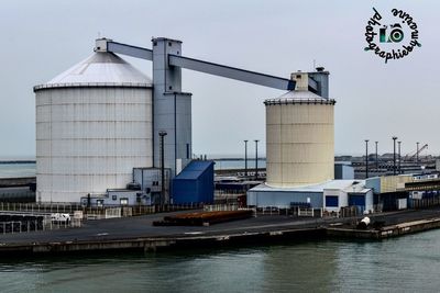 View of factory against sky