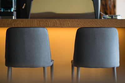 Close-up of empty chair on table