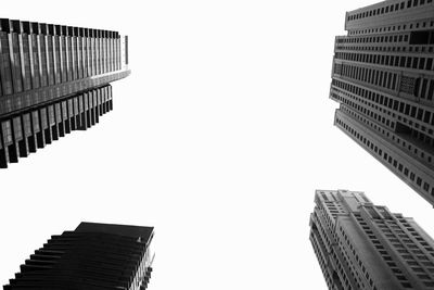 Low angle view of buildings against sky in city