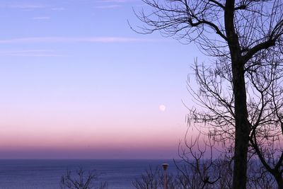 Scenic view of sea against sky at sunset