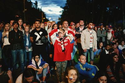 Group of people standing in the city