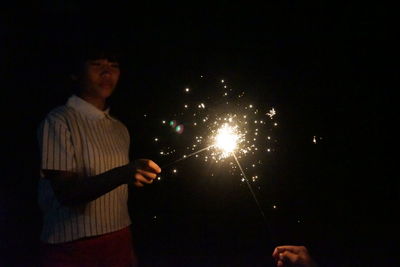 Man and woman at night