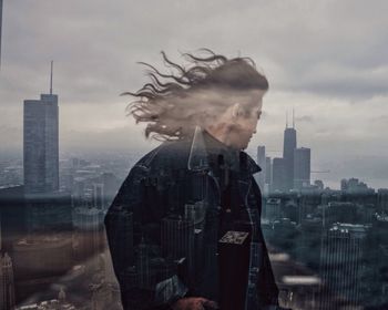 Digital composite image of man with cityscape in background