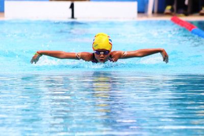 Girl swimming in pool