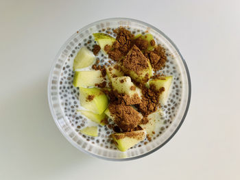 High angle view of food on table against white background