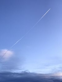 Low angle view of vapor trail in sky