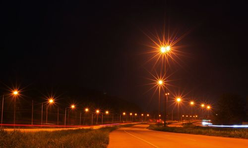 The atmosphere on the highway at night, colorful car lights