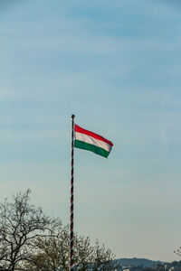 Low angle view of flag against sky