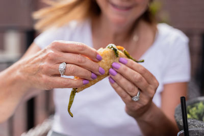 Close-up of woman holding ice cream