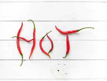 High angle view of red chili pepper on table