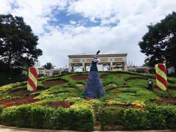 Low angle view of statue against sky