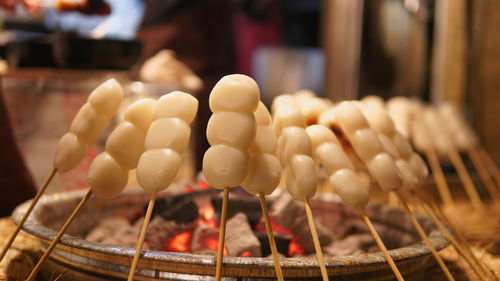 Close-up of dango dumplings on skewers