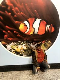 Full frame shot of person swimming in fish tank