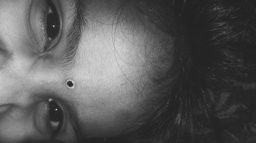 Cropped portrait of girl with bindi