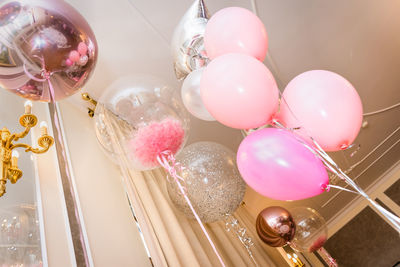 Low angle view of balloons on table