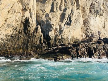 Scenic view of rocks in sea