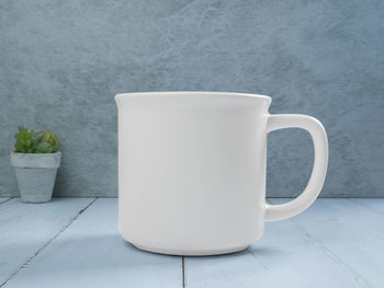 Close-up of coffee served on table