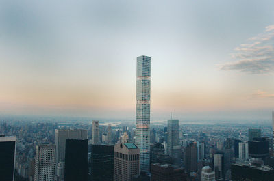 Cityscape against sky during sunset