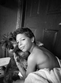 Portrait of teenage girl with dog