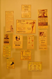 Close-up of information sign on wall