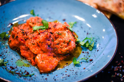 High angle view of meat in plate on table