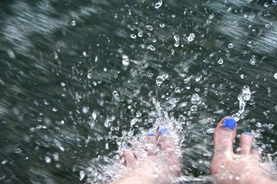 Close-up of person swimming in water