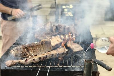 Close-up of meat on barbecue grill