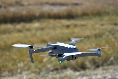 Airplane flying over cable car