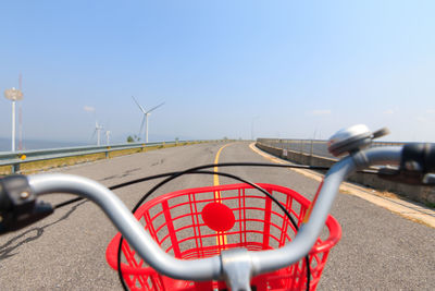 Close-up of wind turbine against sky