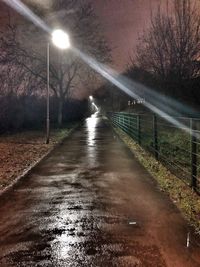 Illuminated street light at night