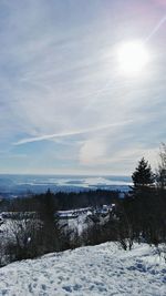 Scenic view of sea against sky during winter