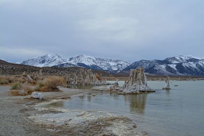 Scenic view of snowcapped mountains against sky - mono lake california