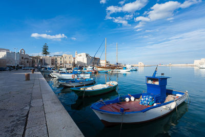 Boats moored in harbor