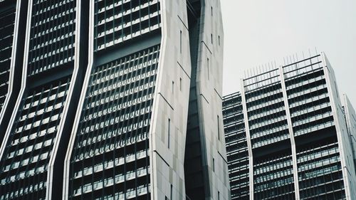 Low angle view of modern building against clear sky