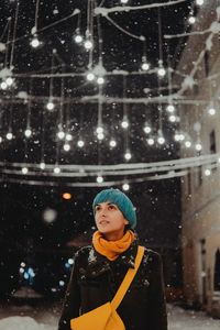 Portrait of a smiling woman in snow