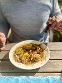 Midsection of man having food