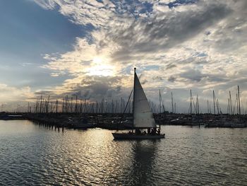 Silhouette of ship sailing in sea