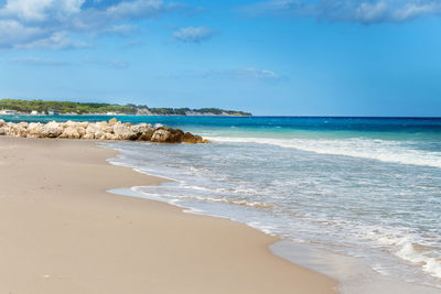 Scenic view of beach against sky